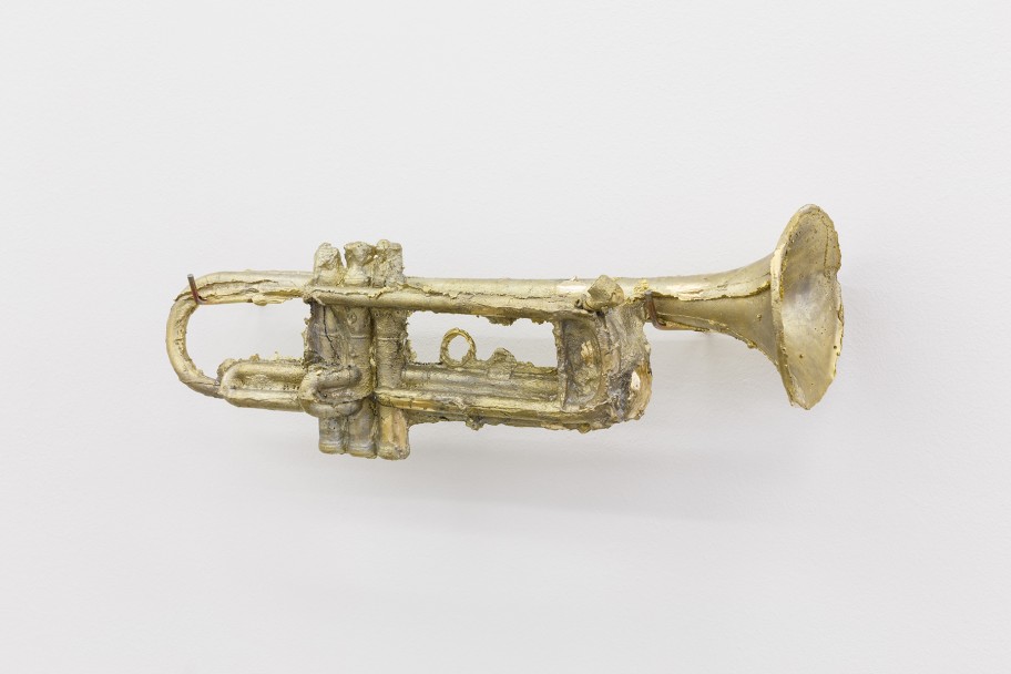 Tania Pérez Córdova Spare change, 2019 brass and bronze (trumpet that was cast, melted and recast into its own mold) 13 x 47 x 15 cm 