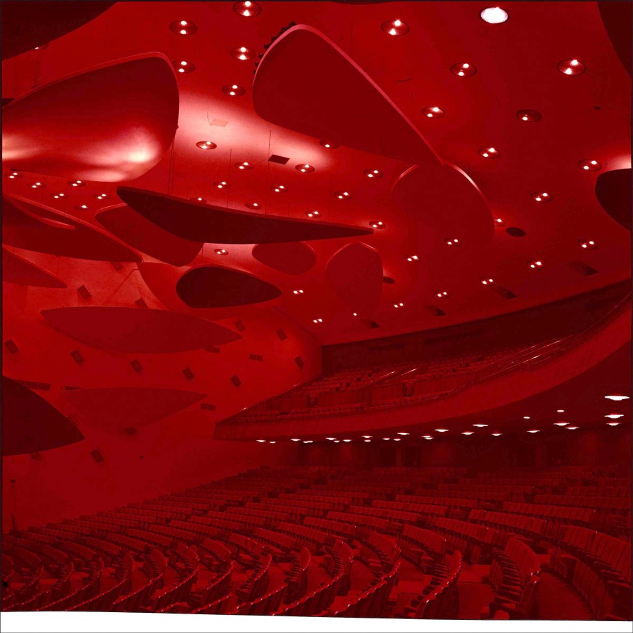 Alessandro Balteo-Yazbeck in collaboration with Media Farzin & Paolo Gasparini  Architect Carlos Raúl Villanueva in collaboration with Alexander Calder. Aula Magna auditorium, Ciudad Universitaria de Caracas, 1954. From the series Modern Entanglements, U.S. Interventions, 2006-2009 (Red detail) Framed C-print from unstable (1954) Kodachrome attributed to Paolo Gasparini, two wall labels with narrative text 184 x 184 cm (framed). Installation dimensions variable 